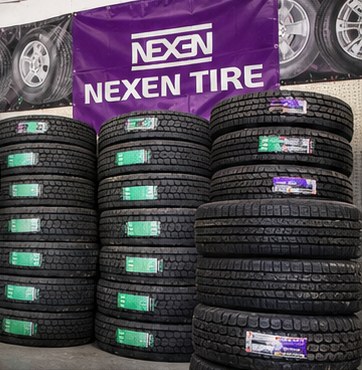 Stacks of new Nexen tires in the Empire Tires shop