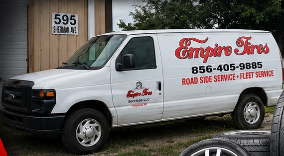Empire Tires service van outside the shop at 595 Sherman Ave